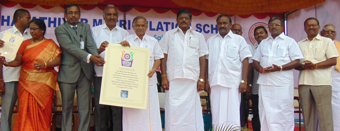 Indian Book of Records certificate presented during a school record achievement ceremony
